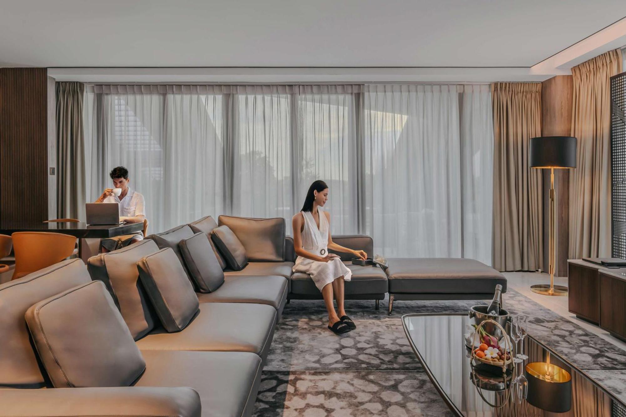Dusit Thani Laguna Singapore Exterior photo The living room of a three-bedroom suite
